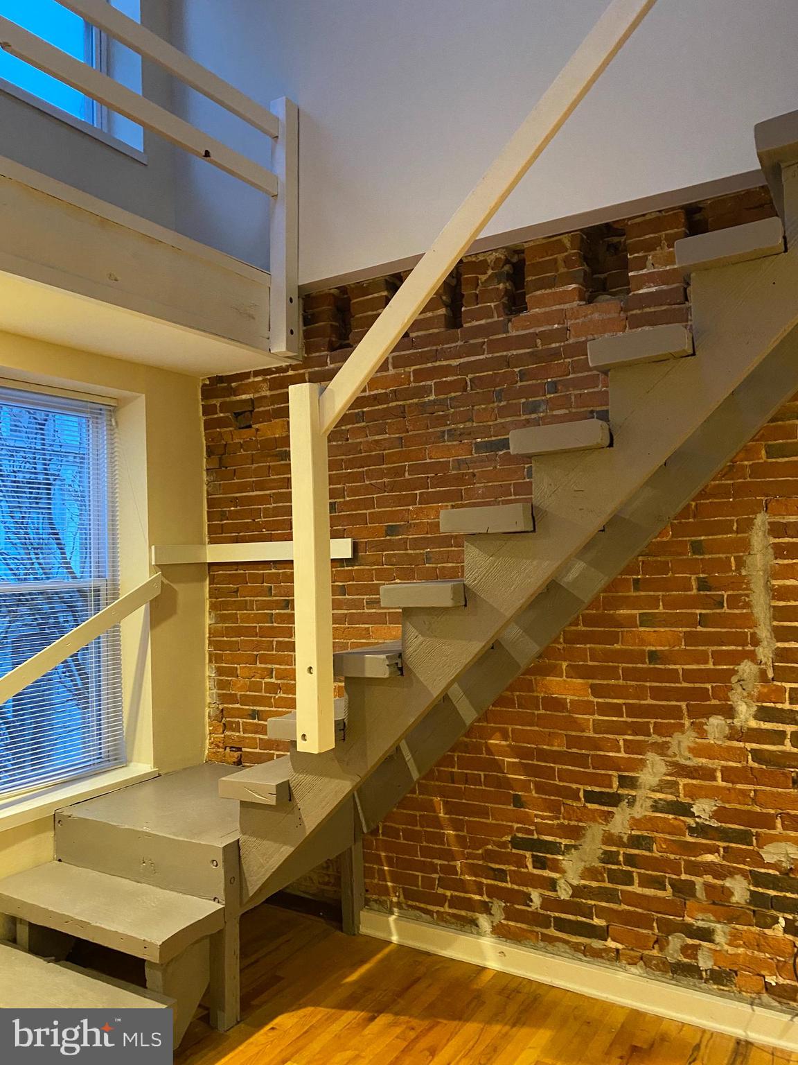 21 North 3rd Street, Unit 4C Philadelphia, PA 19106 - Photo 9 of 14 a view of house with wooden stairs