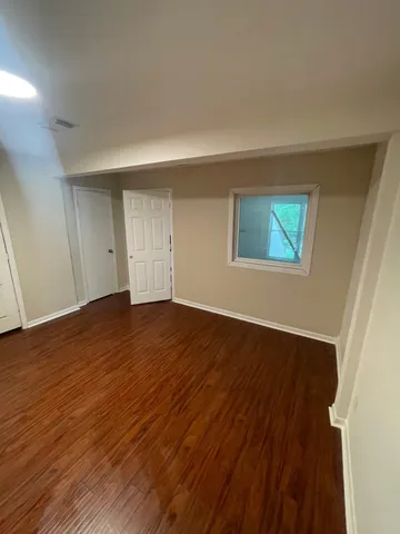 a view of a backyard of the house