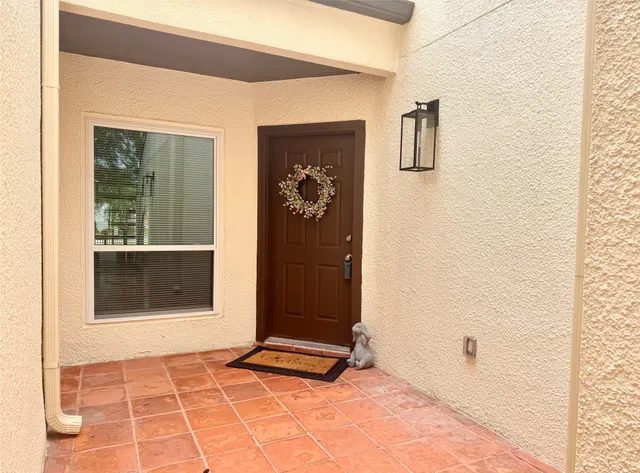a view of a entryway door of the house
