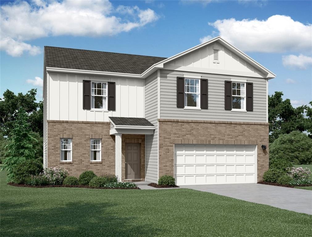 212 Cottontail Lane Villa Rica, GA 30180 - Photo 1 of 1 a front view of a house with a yard and garage
