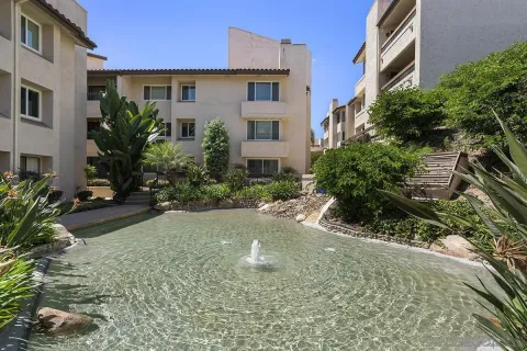 a aerial view of a house with swimming pool