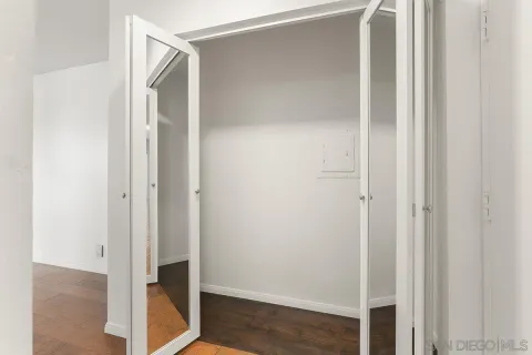 a view of a bathroom with wooden floor