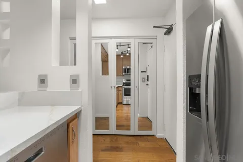 a bathroom with a shower and a sink