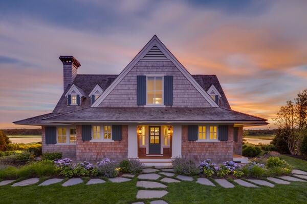 front view of a house with a yard