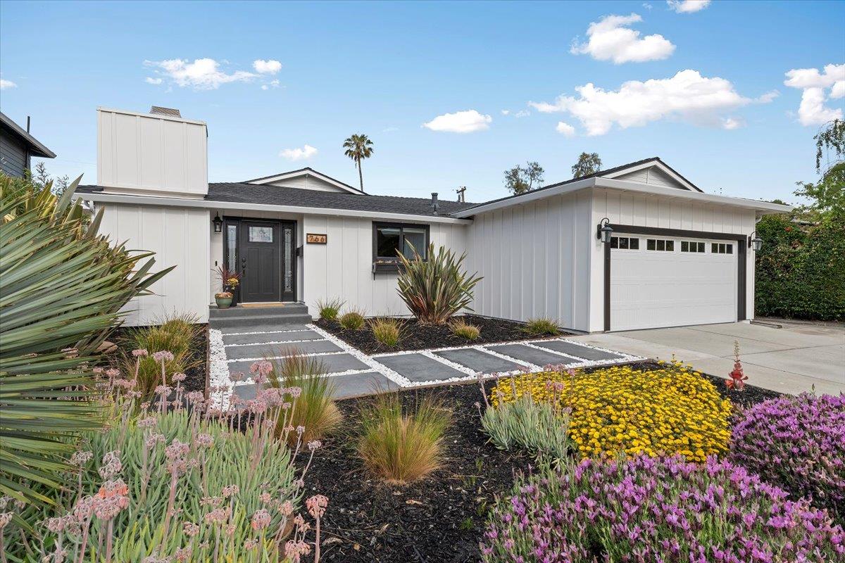 766 Vaquero Drive Mountain View, CA 94043 - Photo 1 of 1 a front view of a house with garden