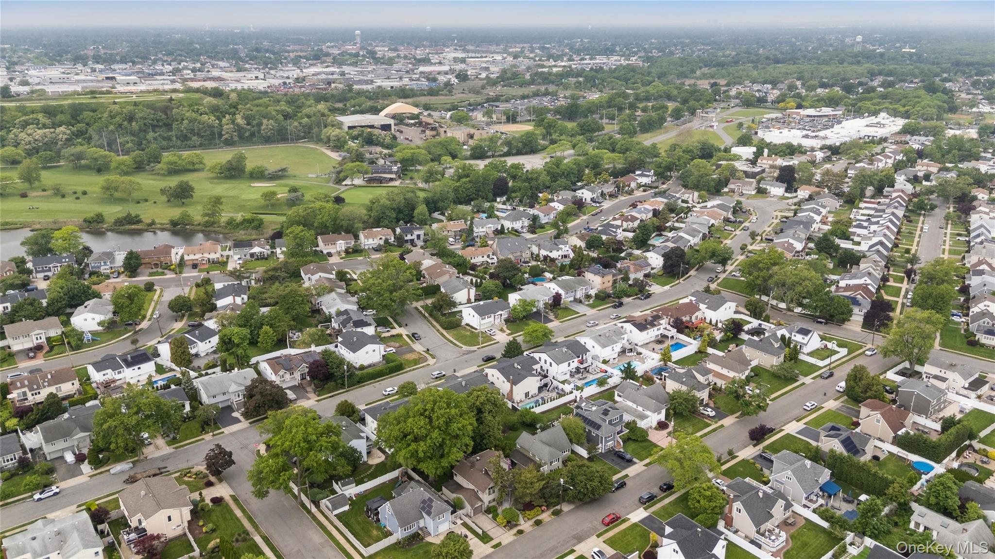 2772 Riverside Avenue Merrick, NY 11566 - Photo 38 of 45 an aerial view of residential houses with city view