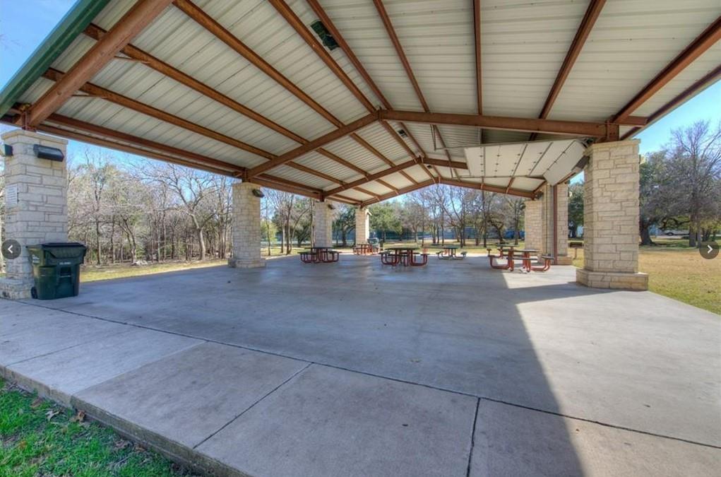 3209 Port Anne Way Leander, TX 78641 - Photo 30 of 30 Expansive covered pavilion with a metal roof and exposed metal framing