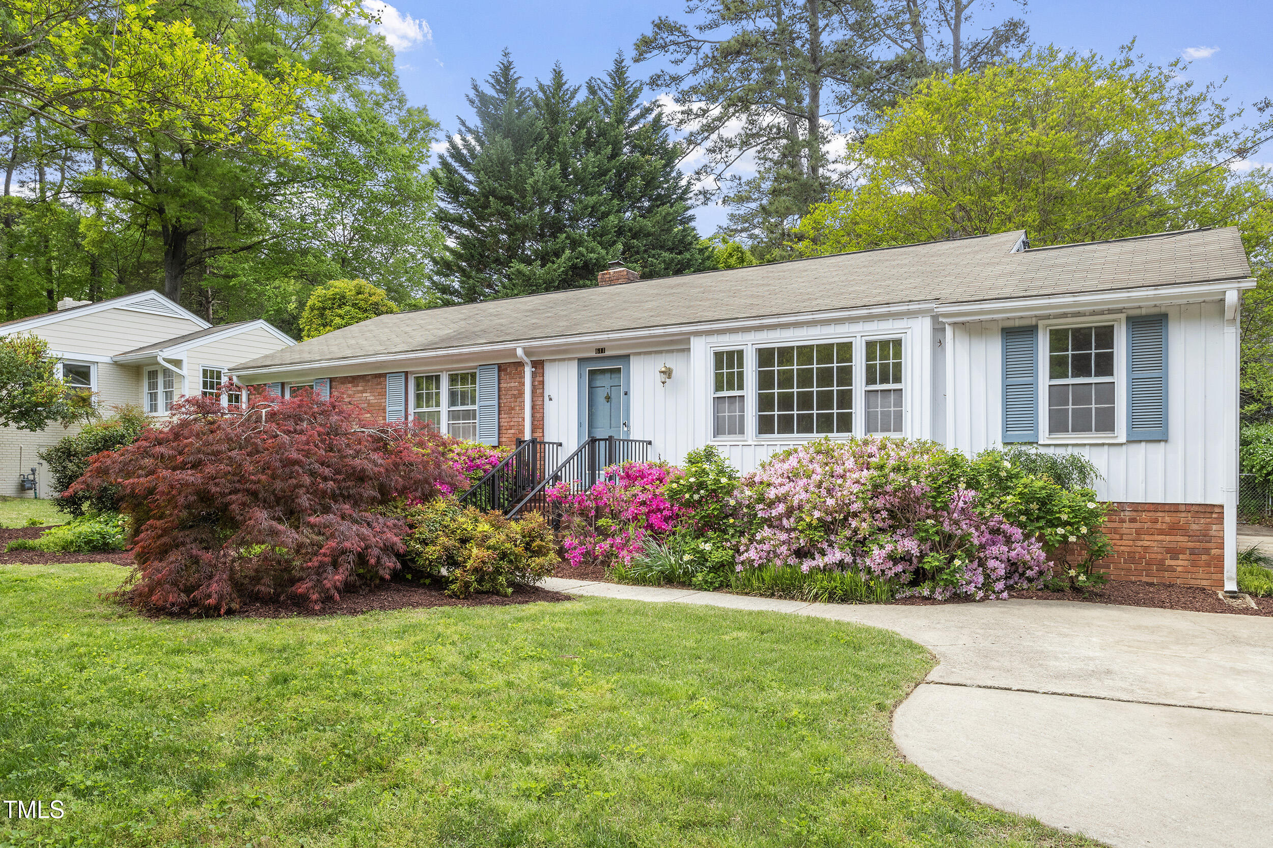 a view of a house with a garden