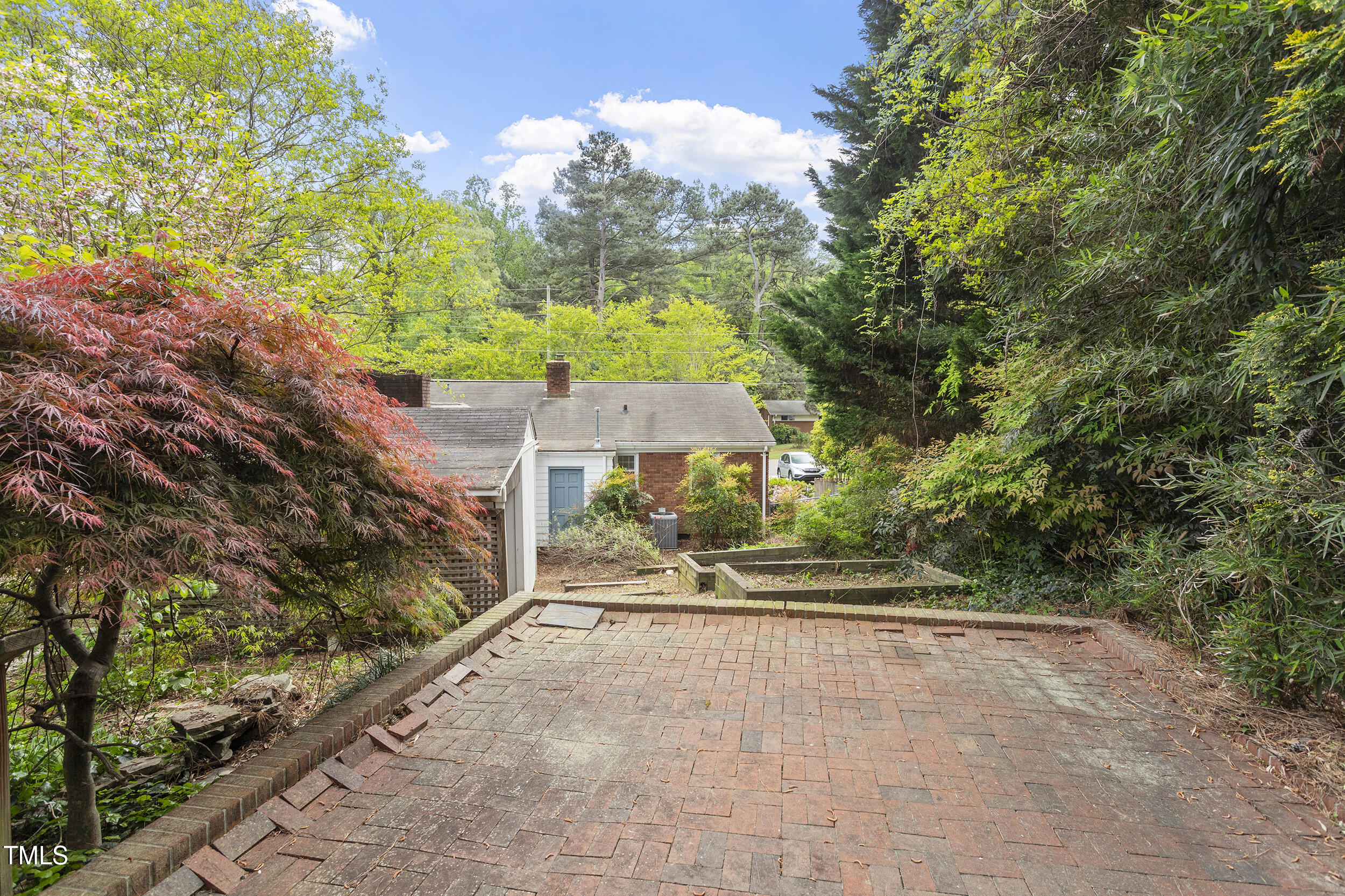 611 Beaver Dam Road Raleigh, NC 27607 - Photo 32 of 36 an aerial view of a house
