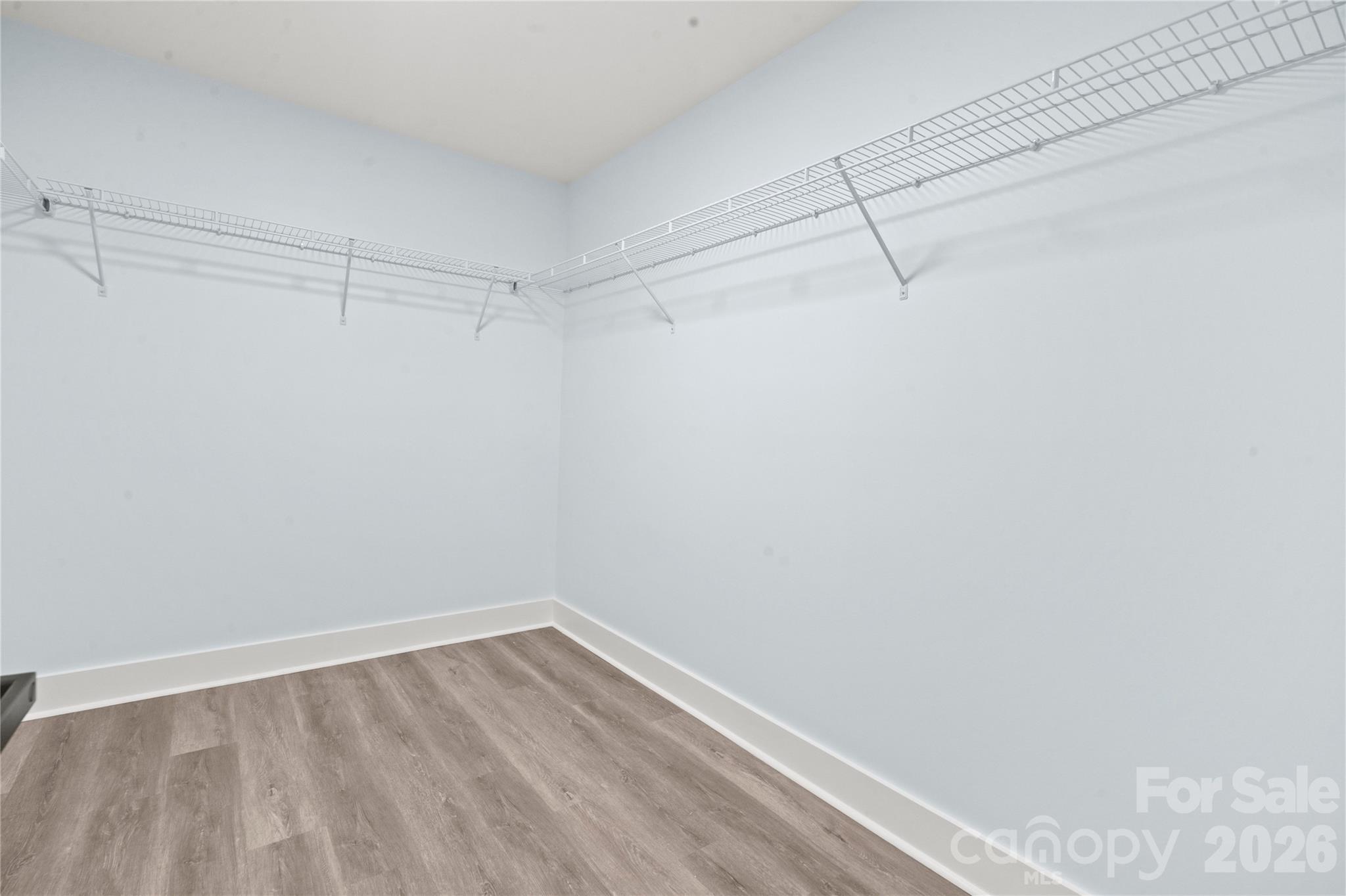 4524 Orphanage Road Concord, NC 28027 - Photo 10 of 29 a view of a room with racks on the wall