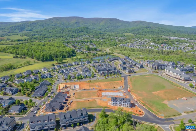 a view of a city with mountains in the background