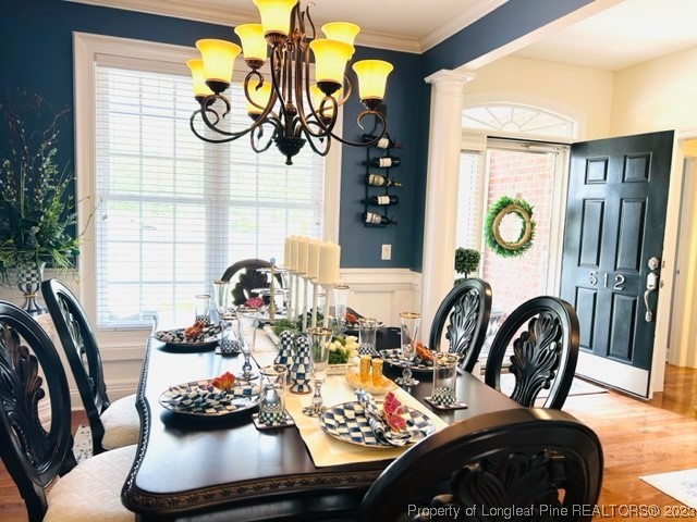 512 Maple Leaf Way Lumberton, NC 28358 - Photo 11 of 27 a view of a dining room with furniture and chandelier