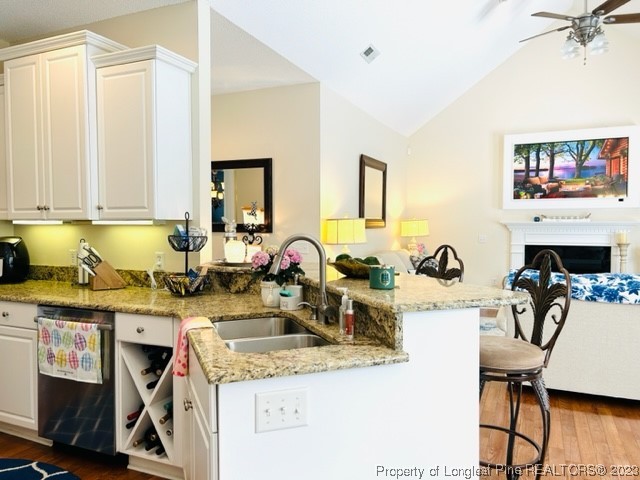 512 Maple Leaf Way Lumberton, NC 28358 - Photo 14 of 27 a view of a kitchen with dining table and chairs