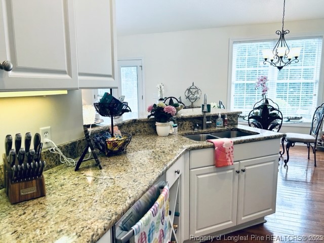 512 Maple Leaf Way Lumberton, NC 28358 - Photo 19 of 27 a kitchen with a sink and cabinets