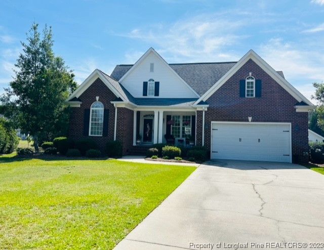 512 Maple Leaf Way Lumberton, NC 28358 - Photo 2 of 27 a front view of a house with swimming pool