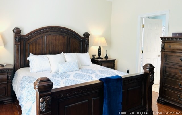 512 Maple Leaf Way Lumberton, NC 28358 - Photo 23 of 27 a bedroom with a bed and a dresser