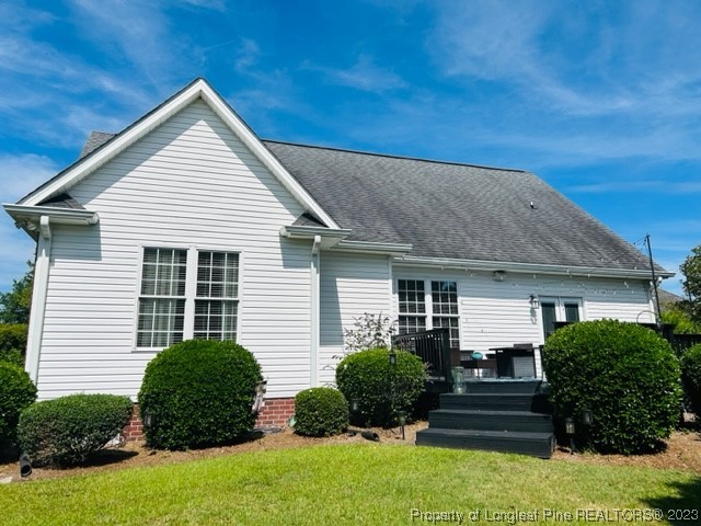 512 Maple Leaf Way Lumberton, NC 28358 - Photo 3 of 27 a front view of a house with a yard