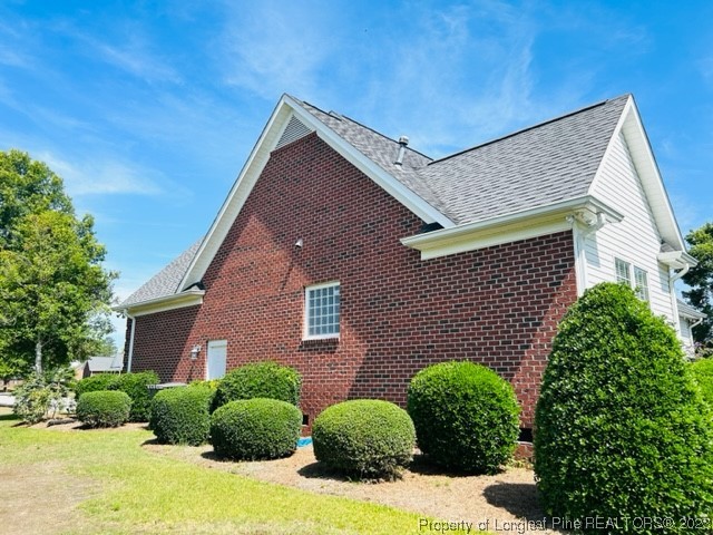 512 Maple Leaf Way Lumberton, NC 28358 - Photo 4 of 27 a front view of a house with garden