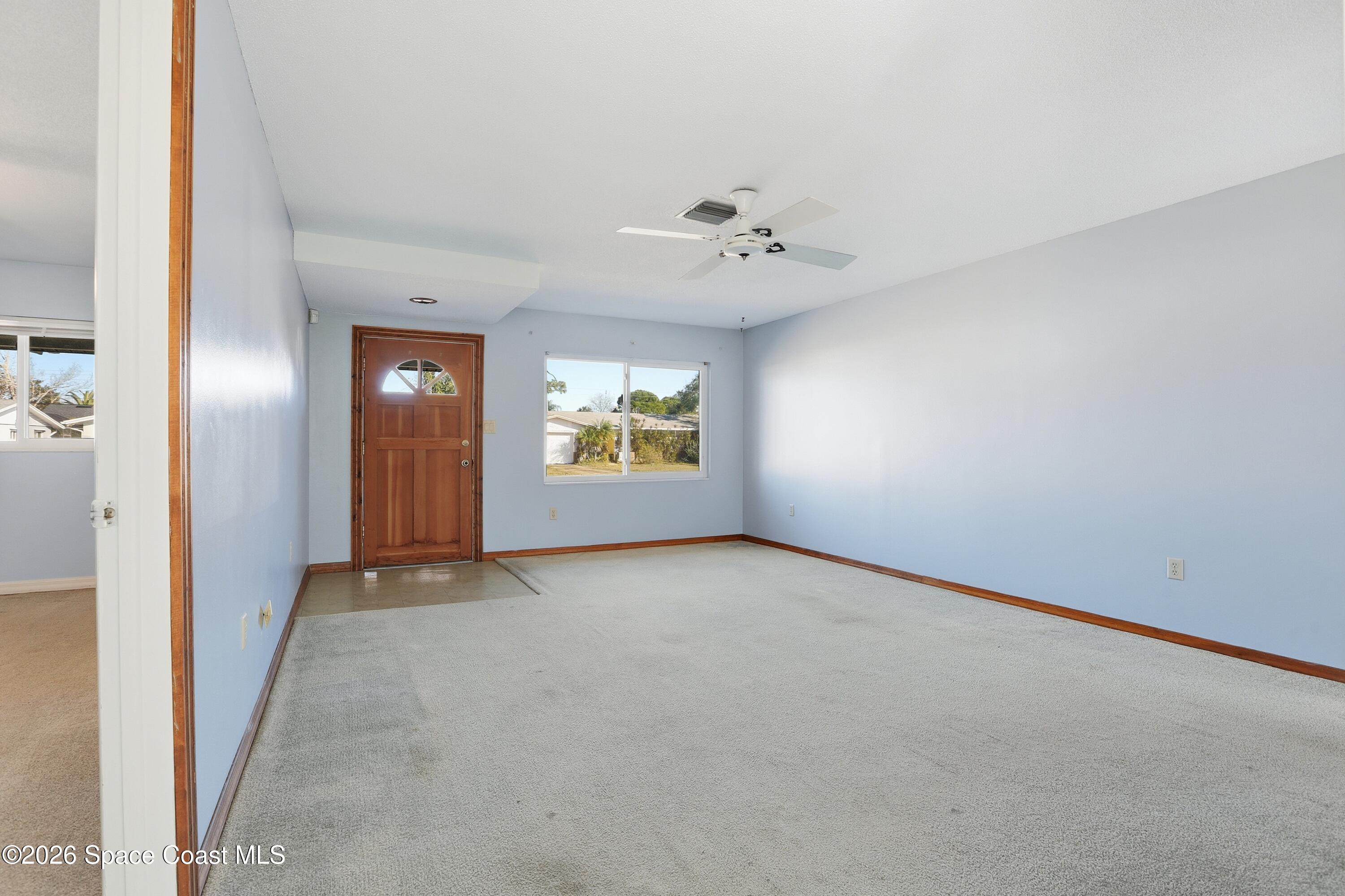 875 Kings Post Road Rockledge, FL 32955 - Photo 4 of 27 Living Room