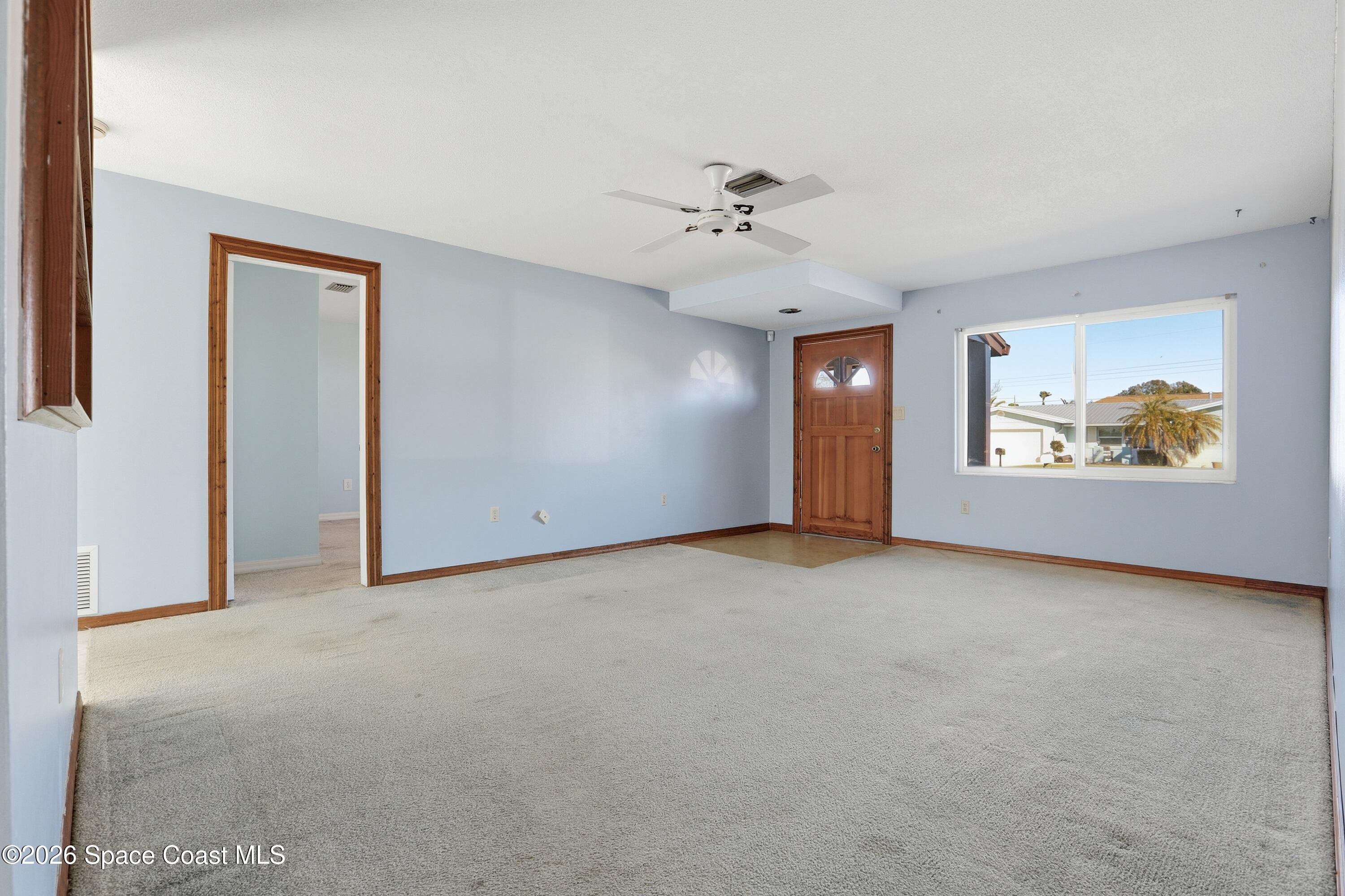 875 Kings Post Road Rockledge, FL 32955 - Photo 5 of 27 Living Room 2