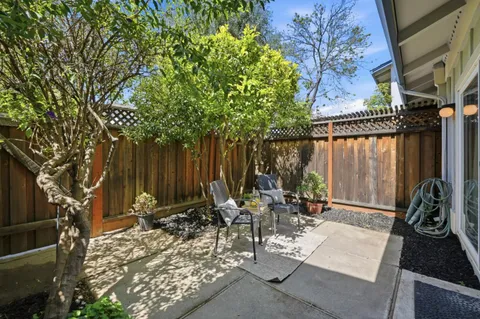 an aerial view of residential house with outdoor space and pool
