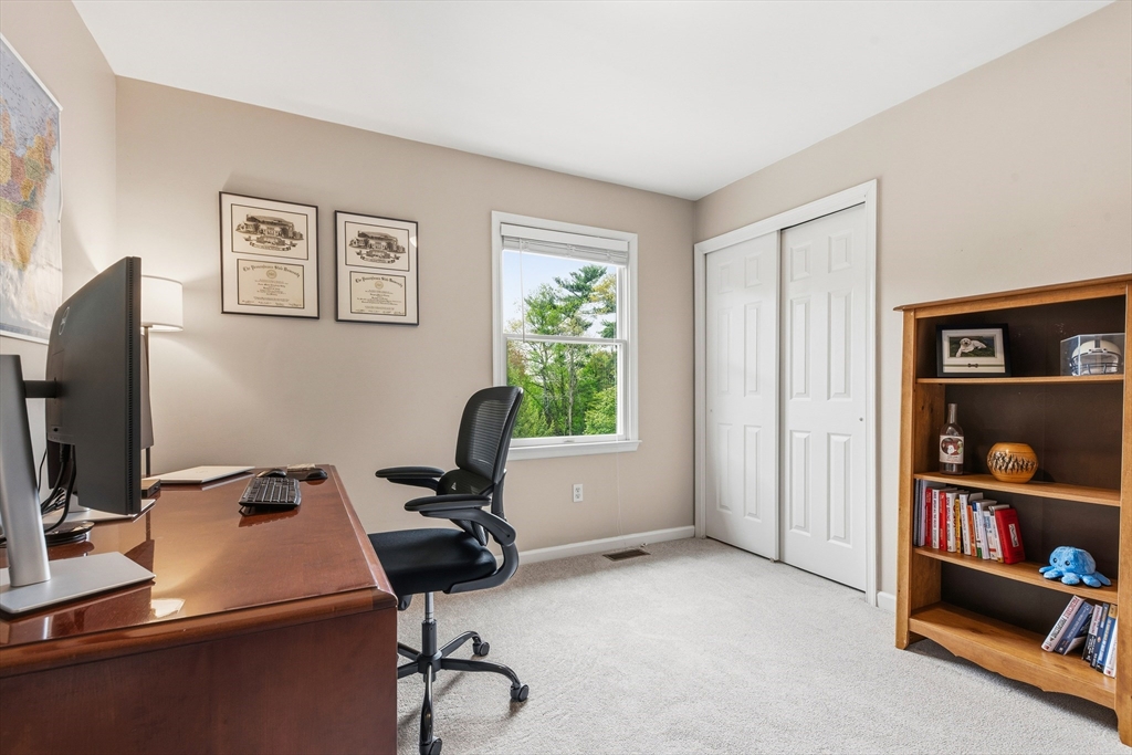 6 Hancock Road Franklin, MA 02038 - Photo 25 of 32 a view of workspace with a window and gym equipment