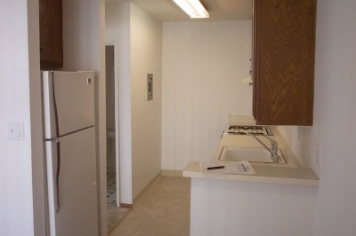 2041 Sierra Road, Unit 1 Concord, CA 94518 - Photo 3 of 4 a room with a refrigerator a washer and dryer