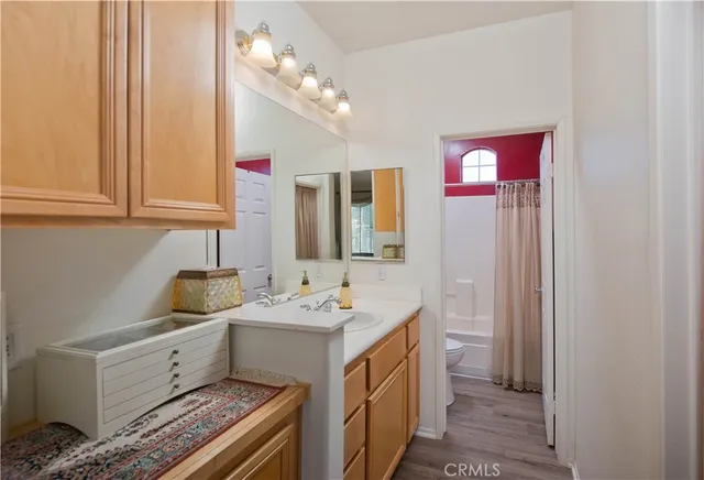 a bathroom with a shower and a toilet