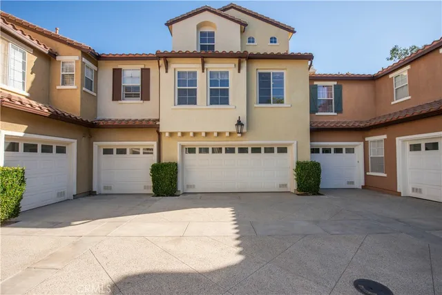 a view of an outdoor sitting area with furniture and table