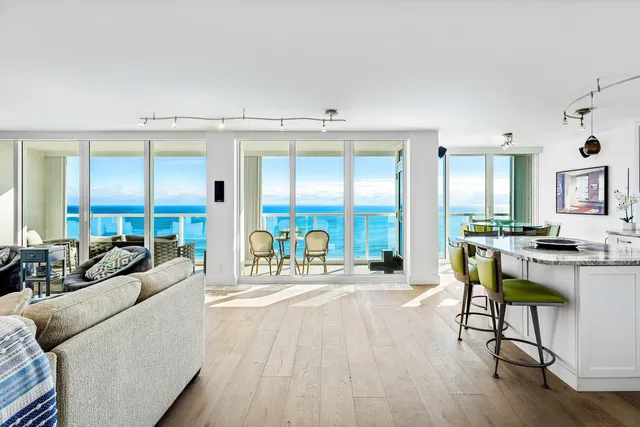 a bedroom with a bed window and a flat screen tv