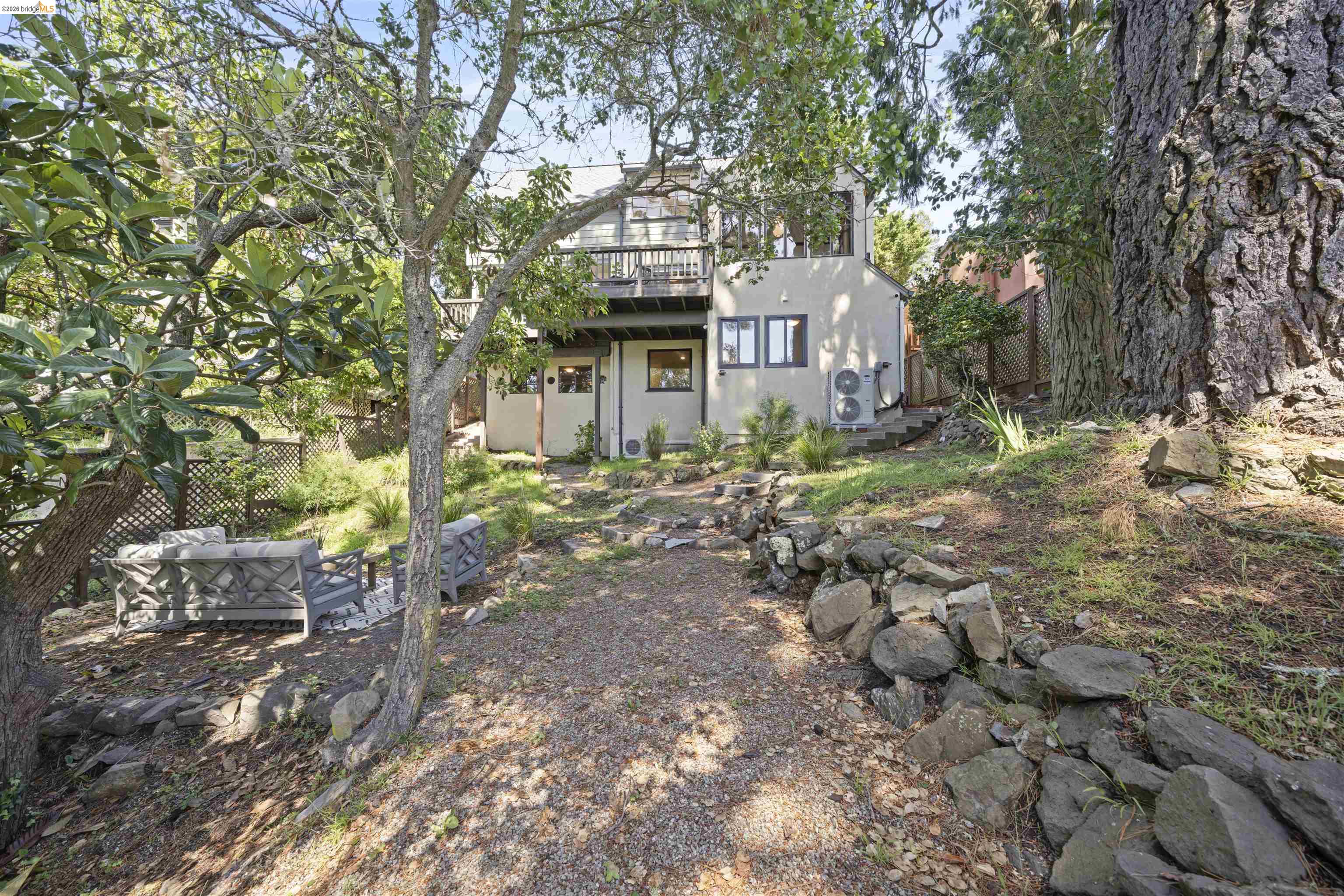 1170 Sterling Avenue Berkeley, CA 94708 - Photo 47 of 52 Back of house with stucco siding, a patio area, and a deck