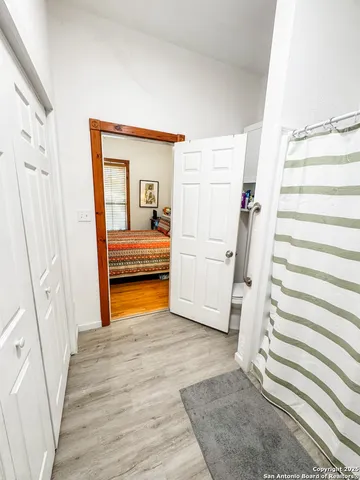 a spacious bathroom with a toilet a sink and a bathtub