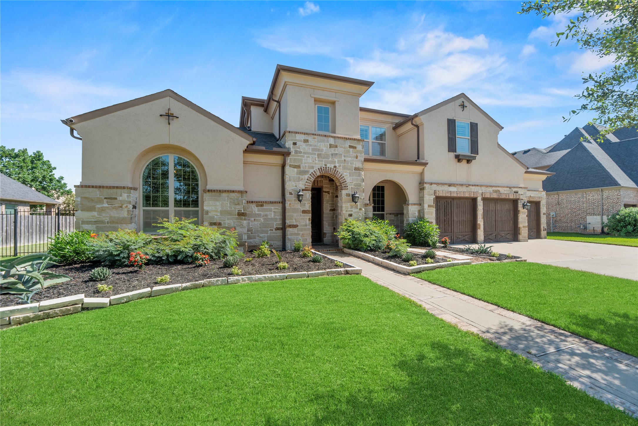 Welcome to 28226 S. Firethorne Road, a premier estate situated in the heart of the Firethorne community. This residence offers unparalleled peace of mind with a comprehensive security system featuring cameras and monitors protecting all windows, both upstairs and down.