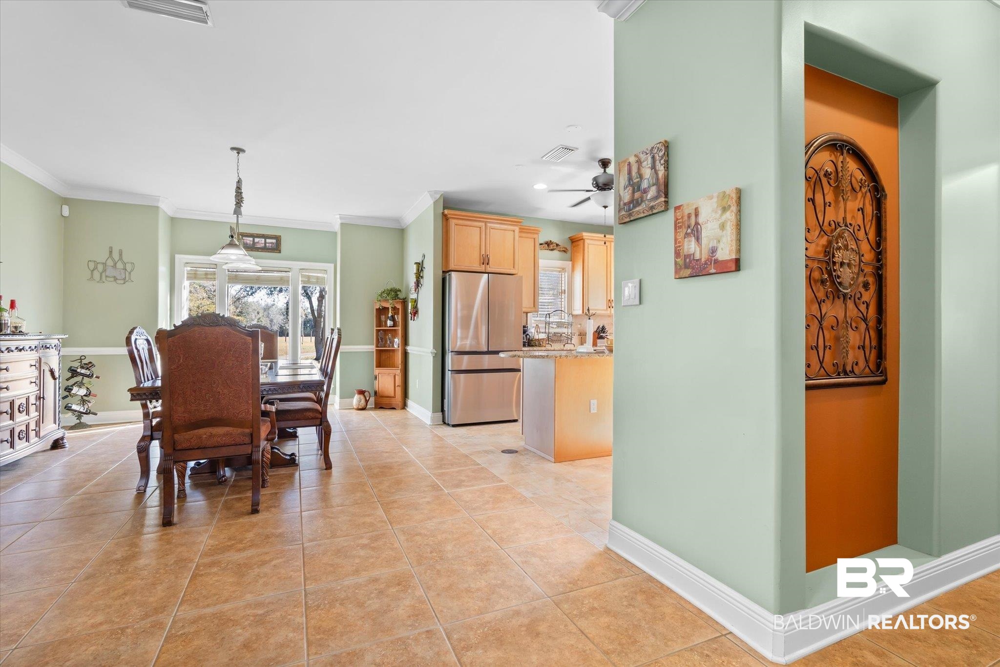 15635 County Road 83 Elberta, AL 36530 - Photo 7 of 54 Tiled dining space with ceiling fan and crown molding
