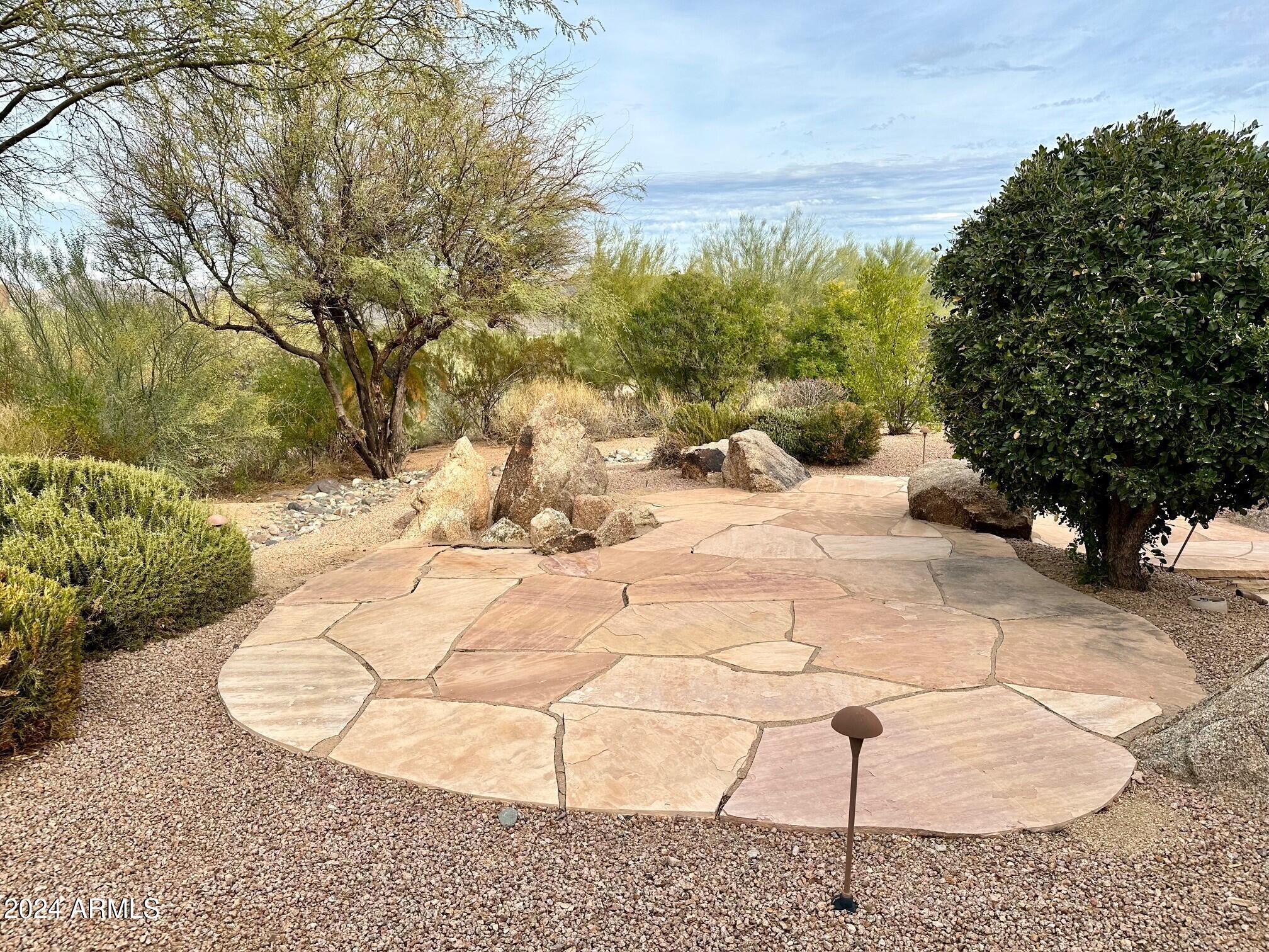 19028 East Picacho Road Rio Verde, AZ 85263 - Photo 25 of 33 026_Flagstone Patio and Firepit