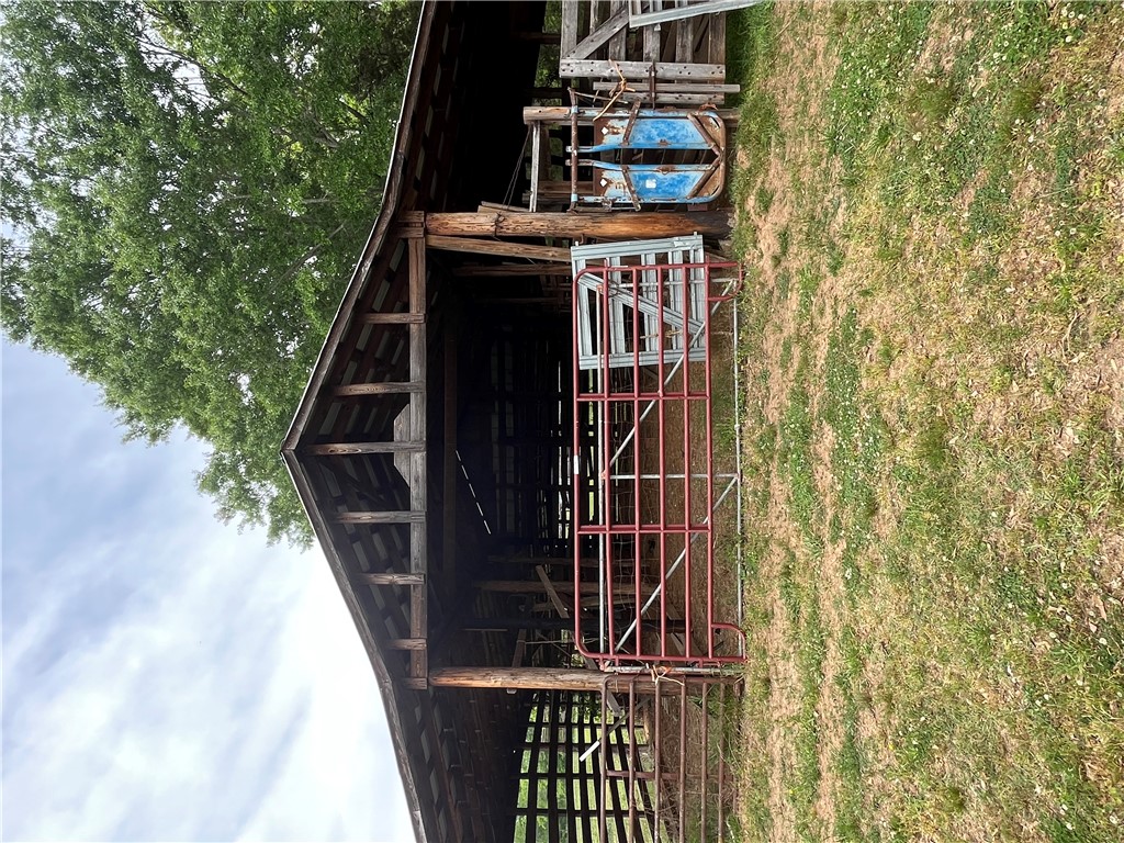 107 Humphrey Wright Road Honea Path, SC 29654 - Photo 14 of 23 This rustic barn offers ample space and a classic aesthetic.