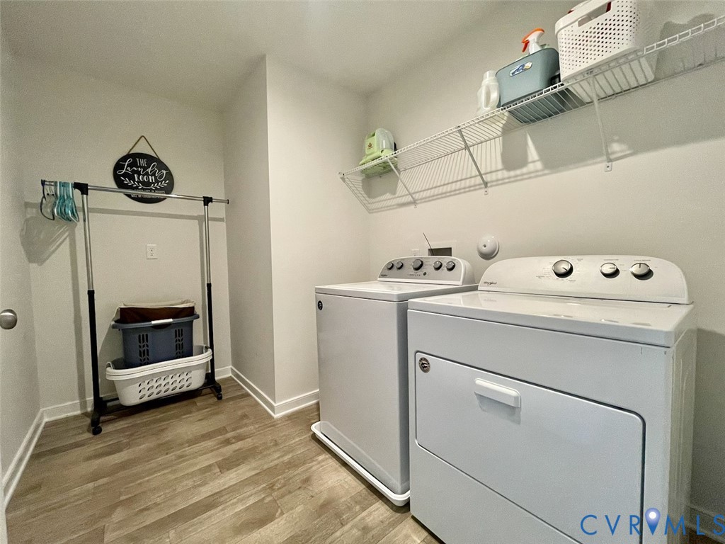 9506 Simonsville Road Midlothian, VA 23112 - Photo 22 of 27 a utility room with dryer and washer