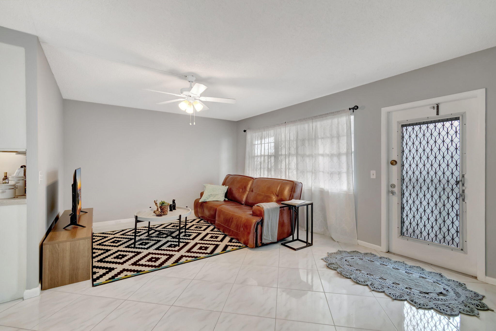 3031 Cornwall East Boca Raton, FL 33434 - Photo 4 of 84 a living room with furniture