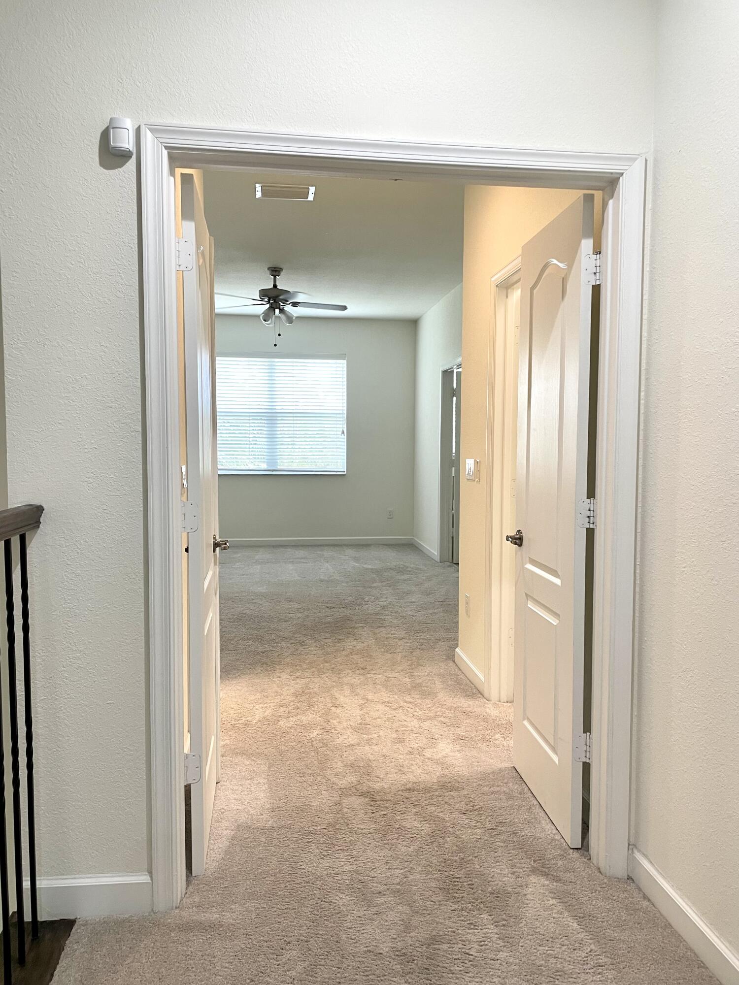 9626 Southwest Purple Martin Way Stuart, FL 34997 - Photo 2 of 48 Double Doors to Master Suite