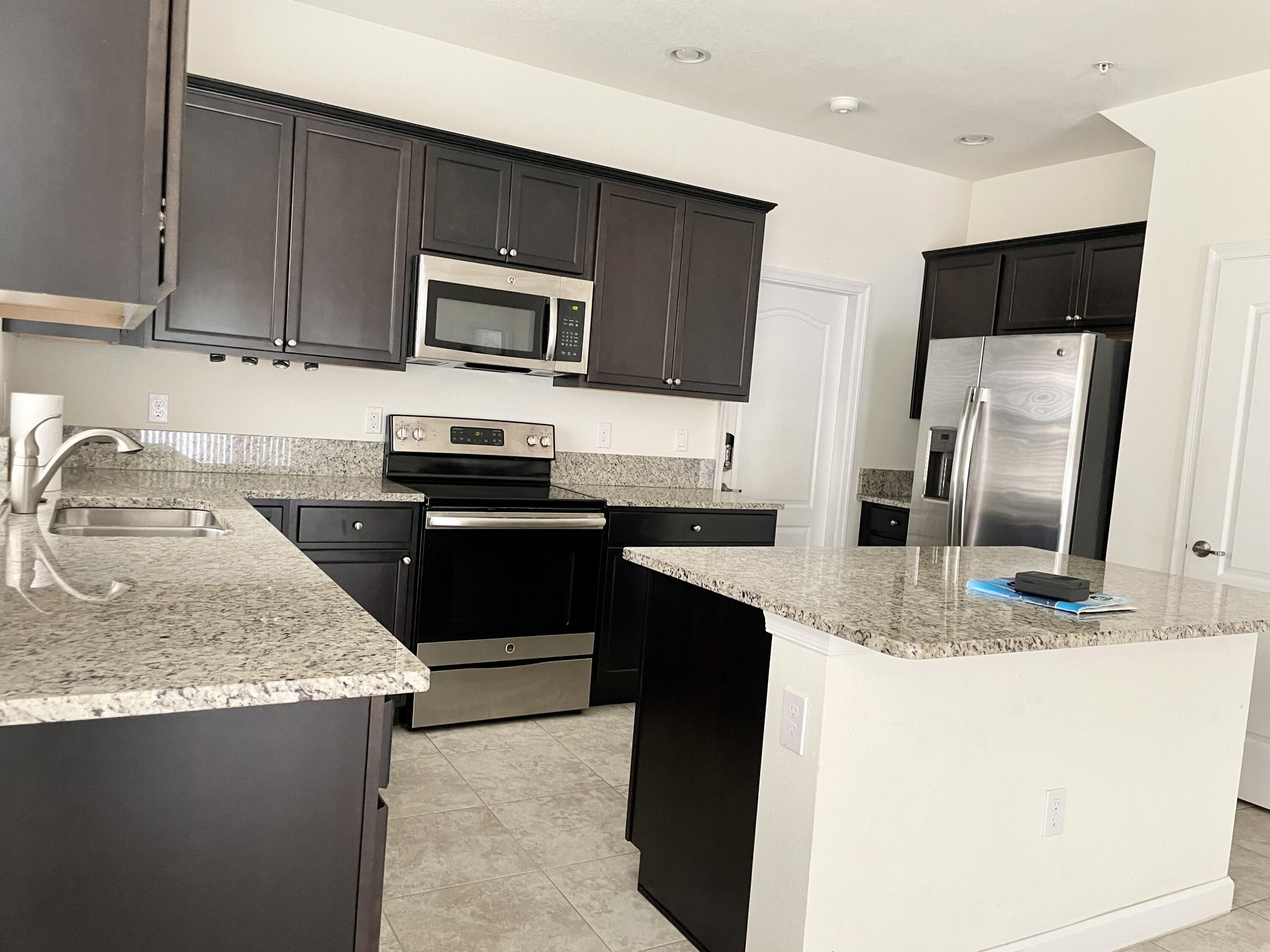 9626 Southwest Purple Martin Way Stuart, FL 34997 - Photo 26 of 48 beautiful kitchen cabinetry