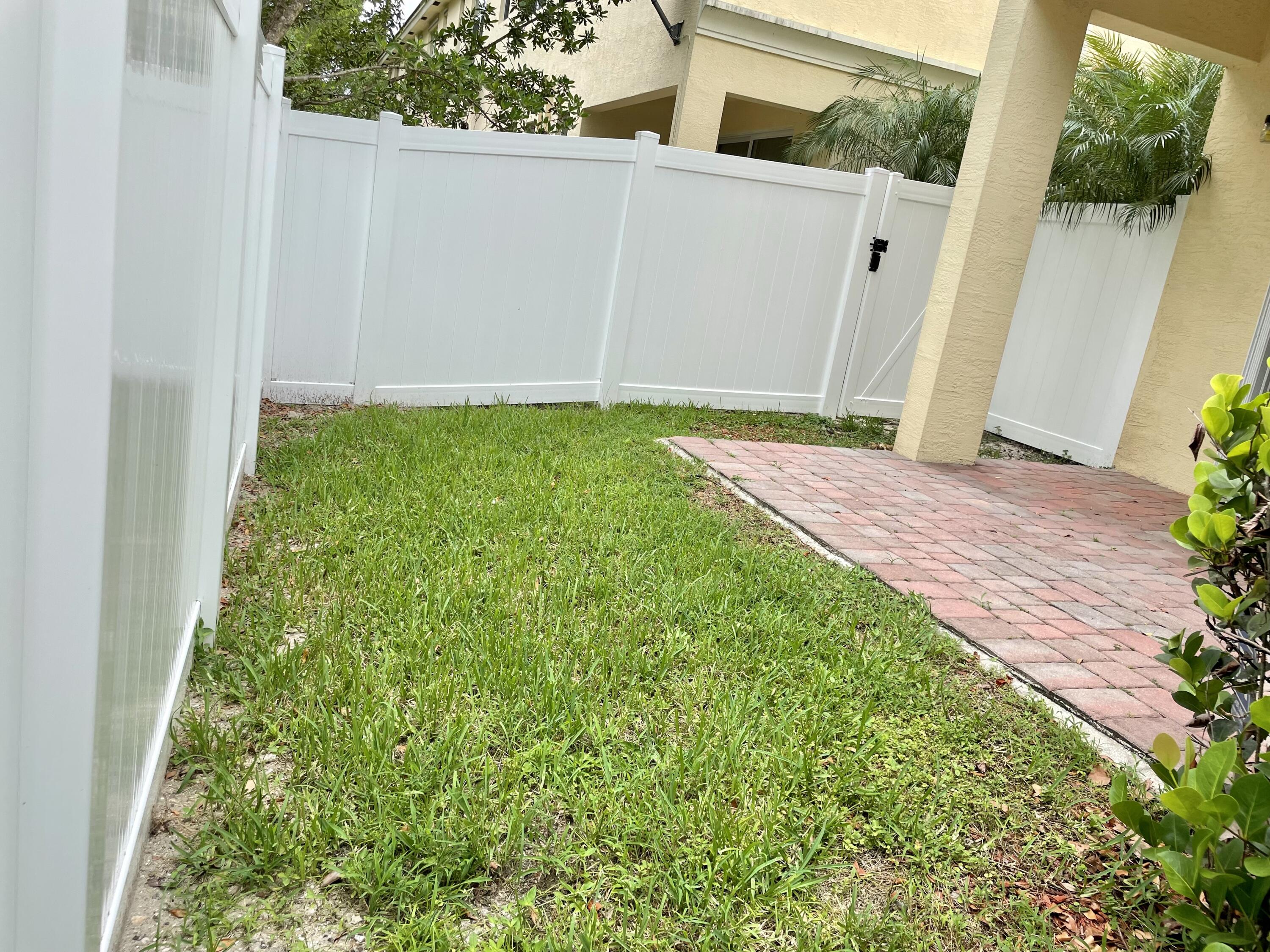 9626 Southwest Purple Martin Way Stuart, FL 34997 - Photo 36 of 48 Brand new Vinyl privacy fence