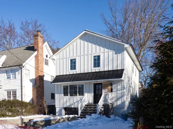a view of a building with a yard