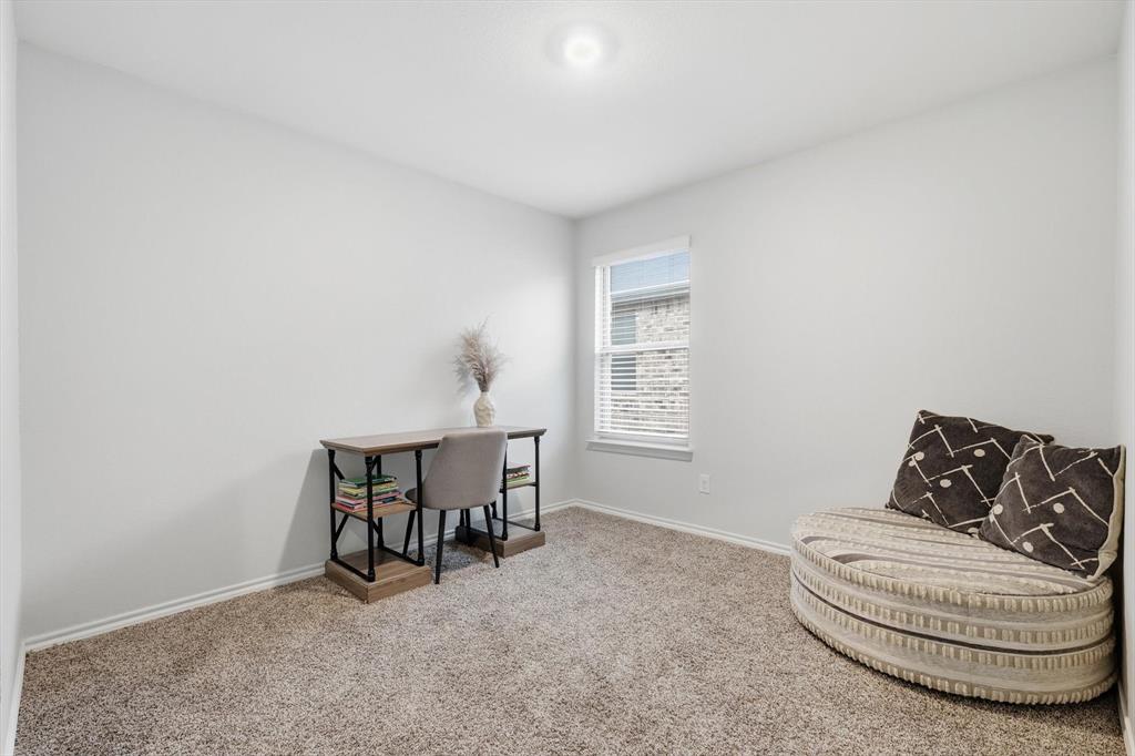 2416 Wildhaven Road Crandall, TX 75114 - Photo 23 of 35 a living room with furniture and a window
