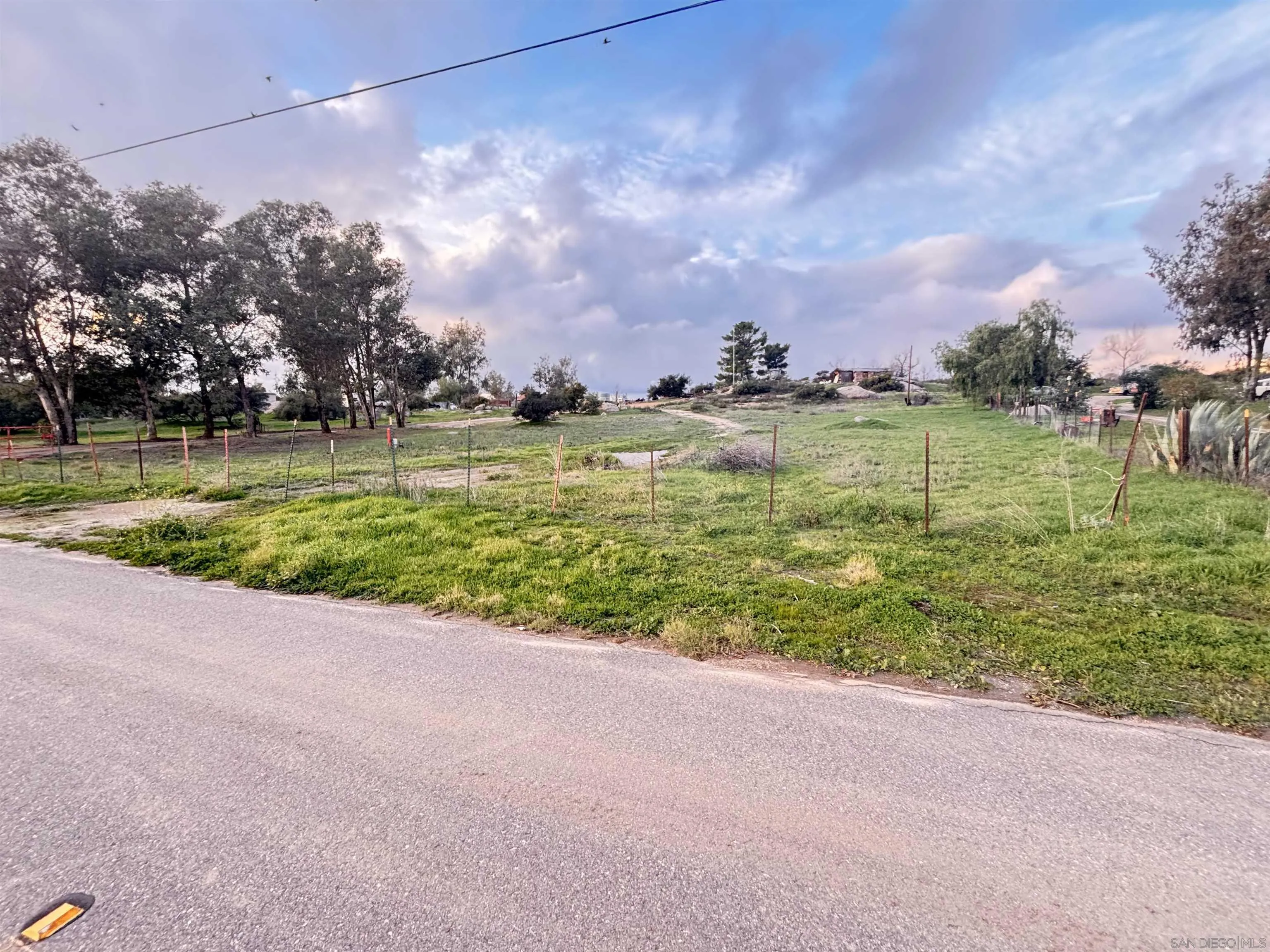 1030 Harris Ranch Road Potrero, CA 91963 - Photo 2 of 10 a view of a lake with a yard