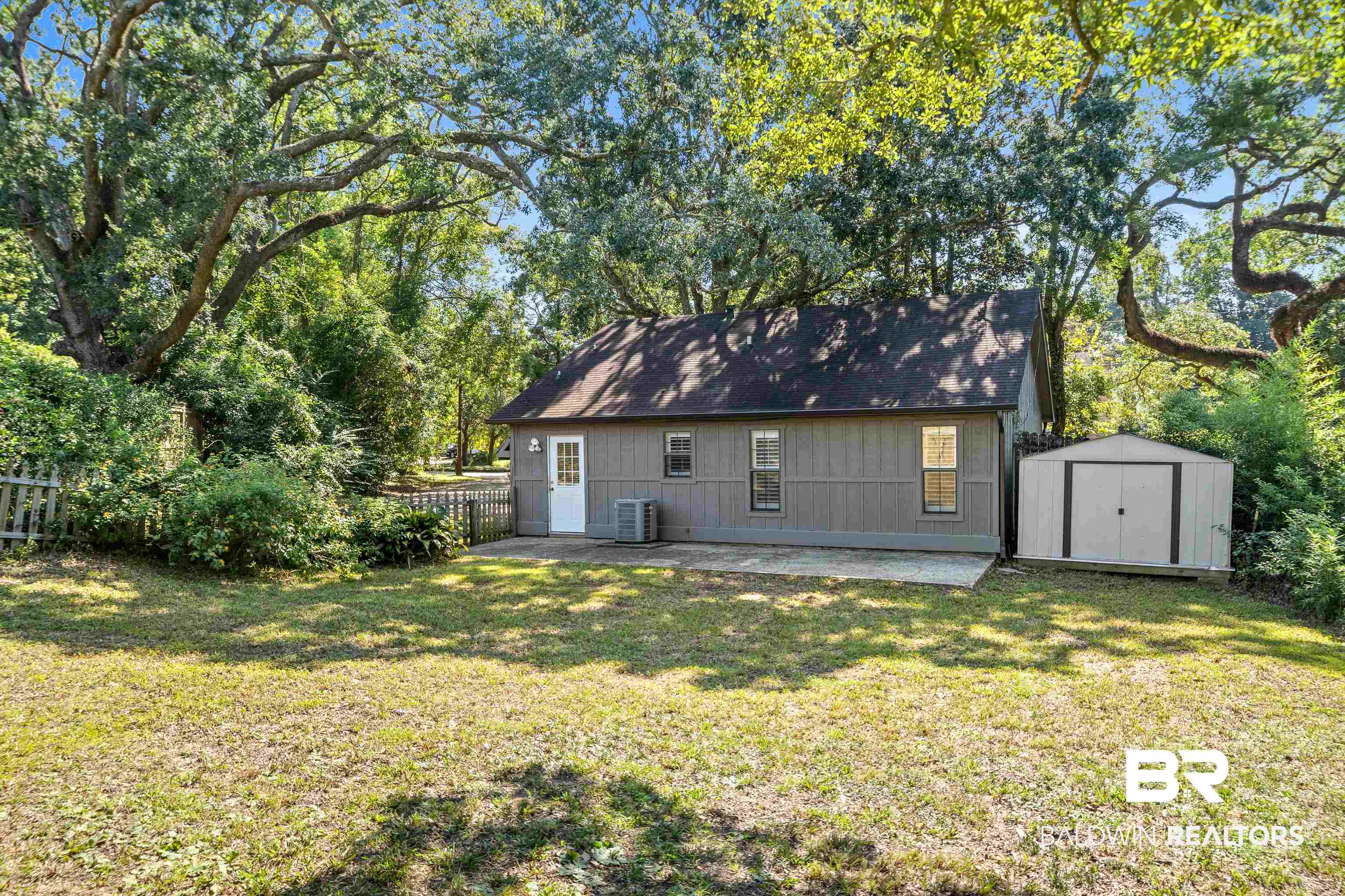 306 Liberty Street Fairhope, AL 36532 - Photo 28 of 32 Large mature live oaks.