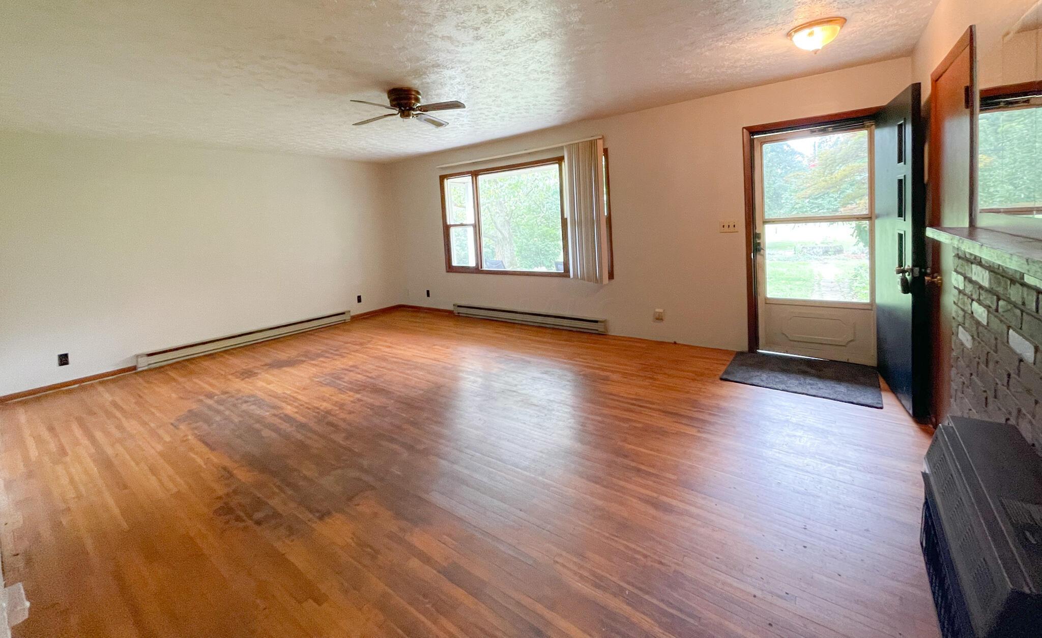 10671 Co Road East Liberty, OH 43319 - Photo 25 of 37 Family room with new interior wall paint.
