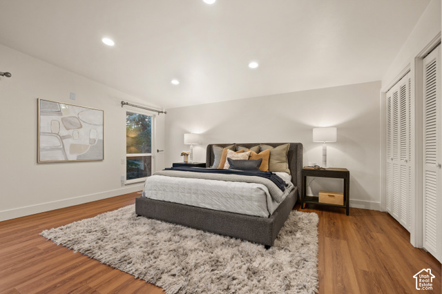 8678 Mount Majestic Road Sandy, UT 84093 - Photo 17 of 37 Recessed ceiling lighting, wood-finish flooring, white walls, and louvered closet doors