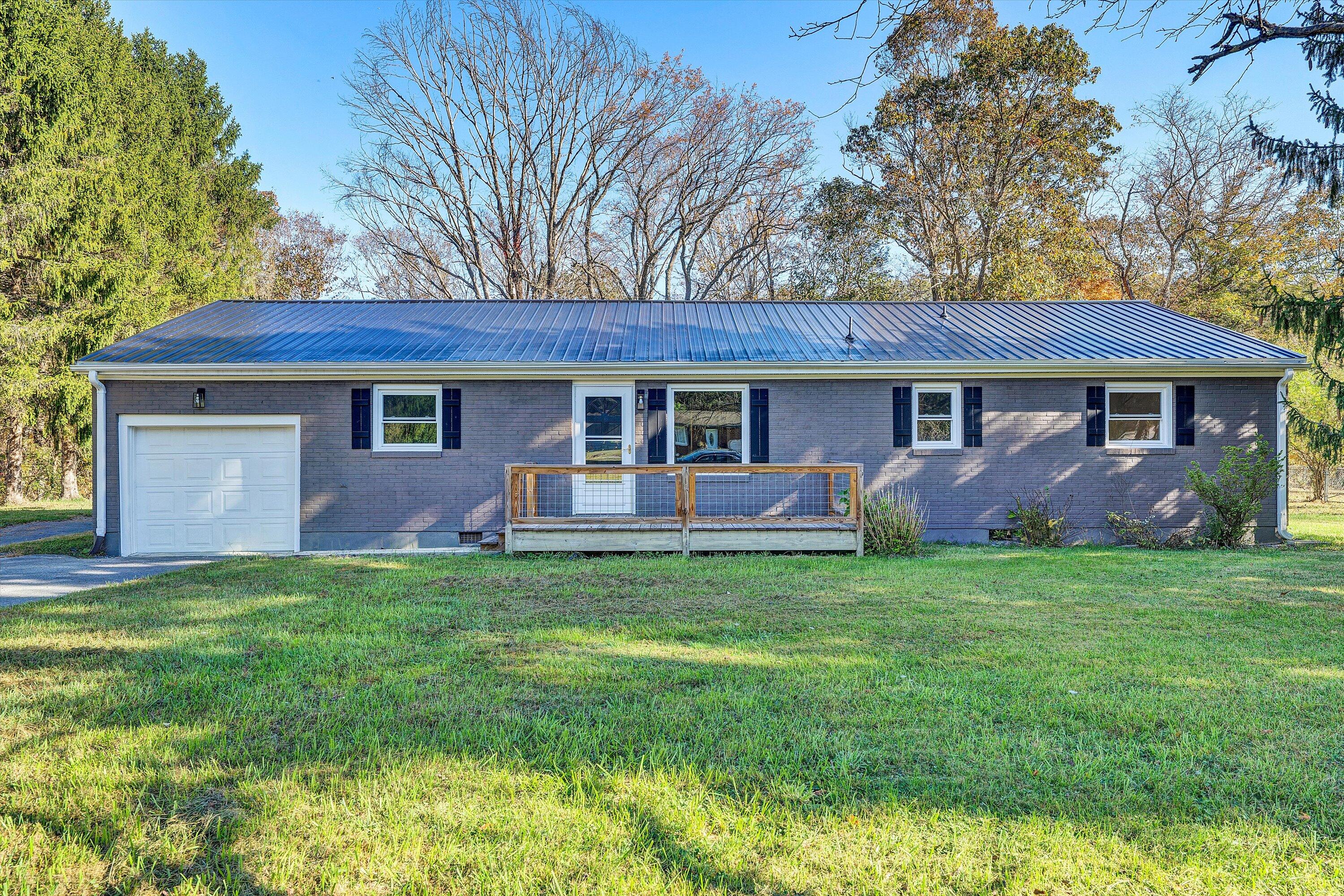 304 Broken Arrow Lane Covington, VA 24426 - Photo 2 of 46 a view of a house with a backyard