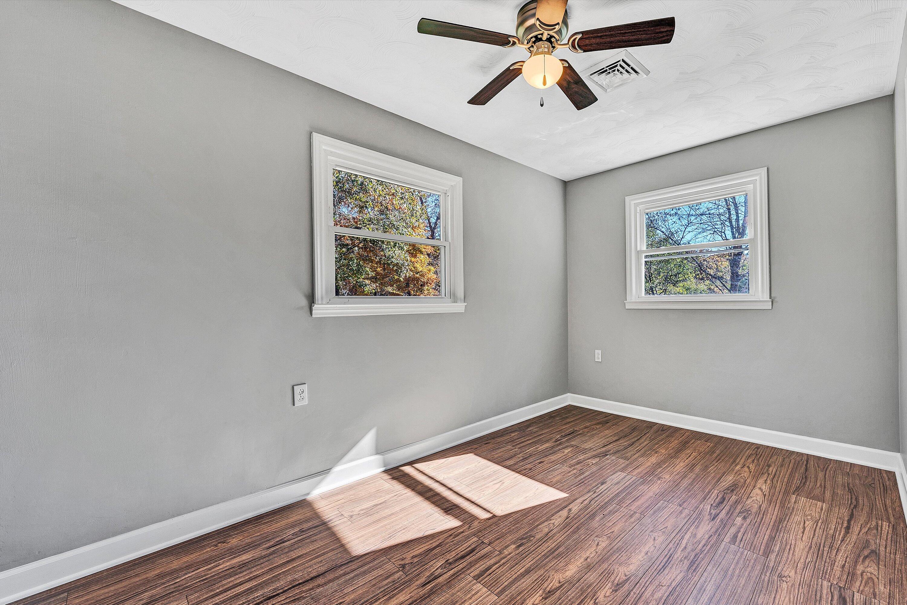 304 Broken Arrow Lane Covington, VA 24426 - Photo 22 of 46 a view of empty room with wooden floor