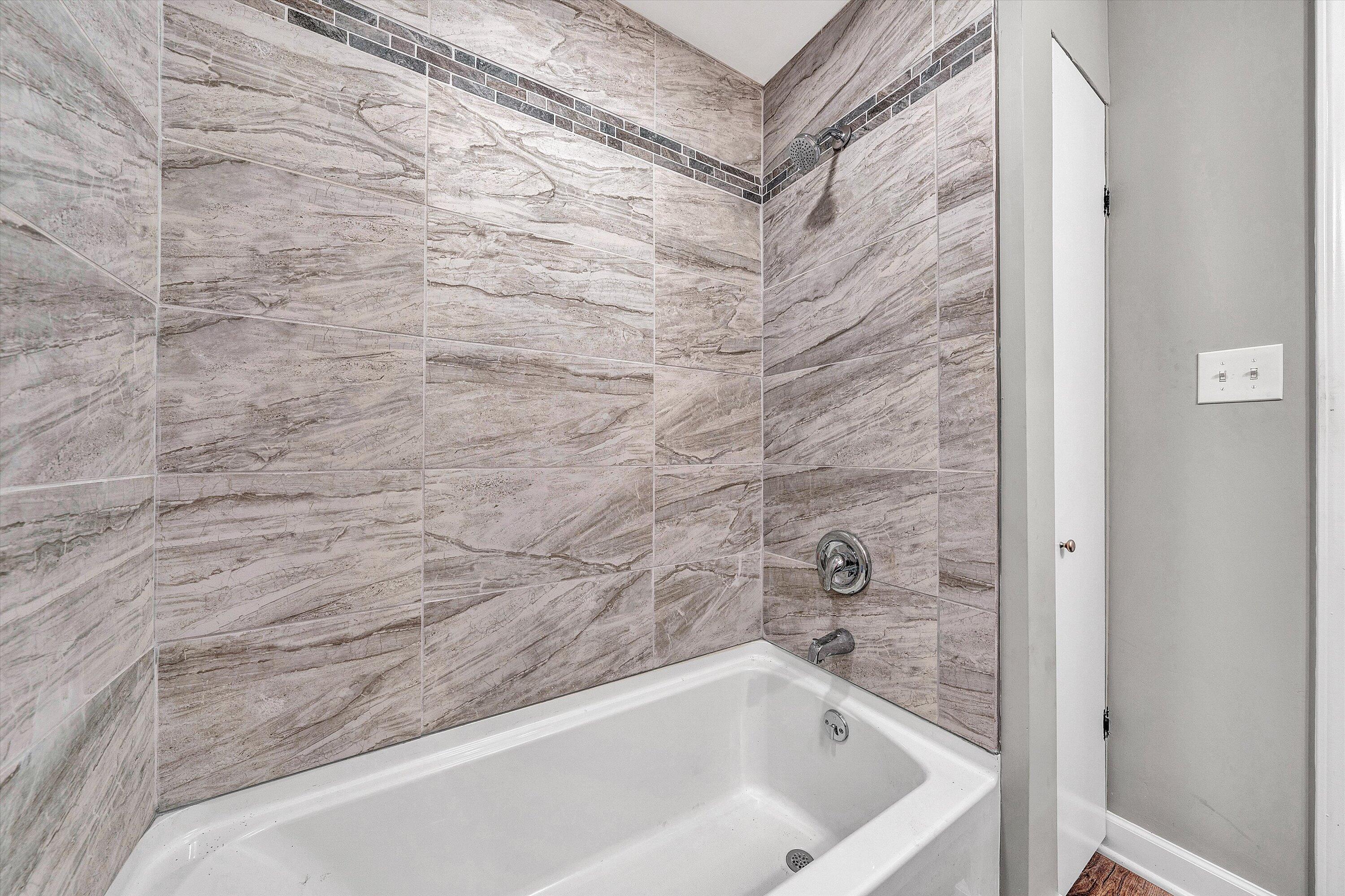 304 Broken Arrow Lane Covington, VA 24426 - Photo 24 of 46 a bathroom with a bathtub
